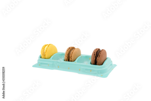 Yellow, light brown and dark brown macaroons