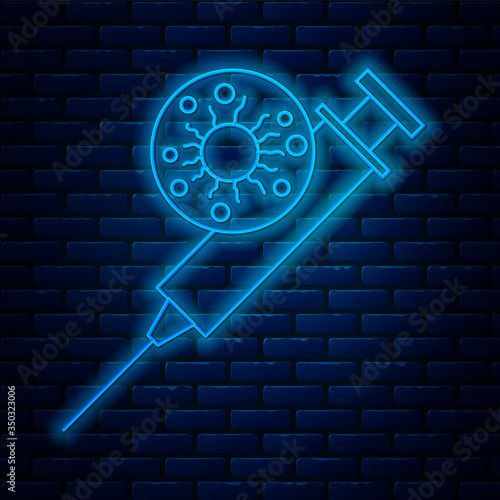 Glowing neon line Syringe and virus icon isolated on brick wall background. Syringe for vaccine, vaccination, injection, flu shot. Medical equipment. Vector Illustration