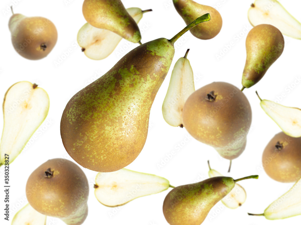 Levitation halves and a whole pear on a light background. Image with selective focus. Levitation halves and a whole pear on a light background. Image with selective focus.