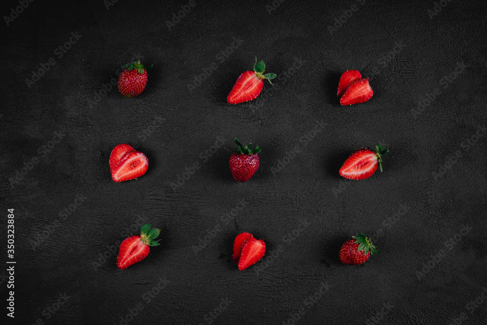 Strawberry on dark background. Top view. Copy space for text message. Strawberry on dark background. Top view. Copy space for text message.