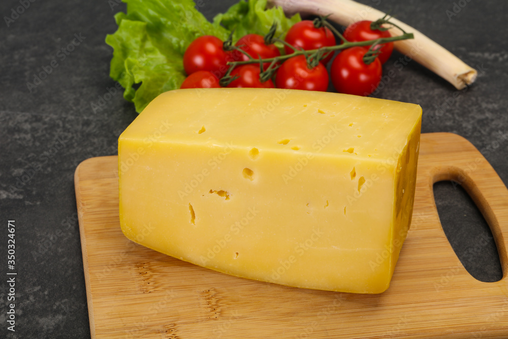 Hard yellow tasty cheese brick Hard yellow tasty cheese brick