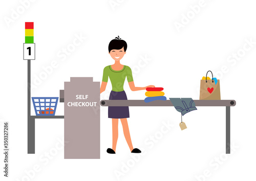 Self-service cashier or terminal. Woman customer shopping in self checkout supermarket.
