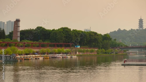 guandong province foshan city sunset time famous lakeside park main square panorama timelapse 4k china photo