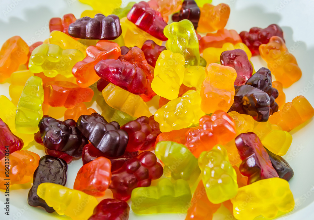 A lot of jelly bears. Background from multi-colored jelly candies. A lot of jelly bears. Background from multi-colored jelly candies.