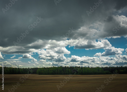 storm clouds over the field