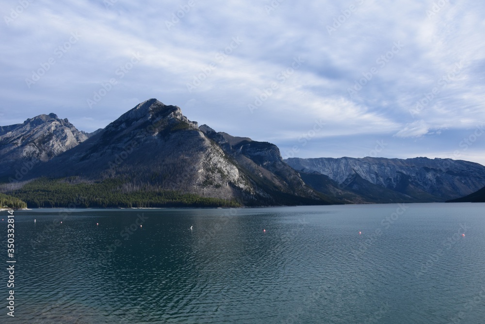 Canadian Rockies - Banff and Jasper national parks. Mountains, rivers and lakes, pristine nature, clear October air. Canadian Rockies - Banff and Jasper national parks. Mountains, rivers and lakes, pristine nature, clear October air.