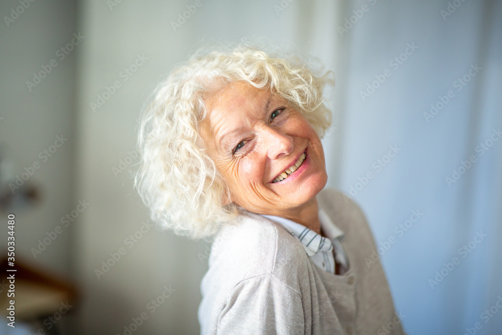 Close up beautiful older woman laughing
