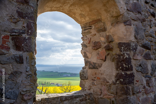 Medieval Castle Brahehus a Swedish Famous landmark By the lake Vattern near Granna in Smaland, Sweden. Castle Window View of open landscape.  photo