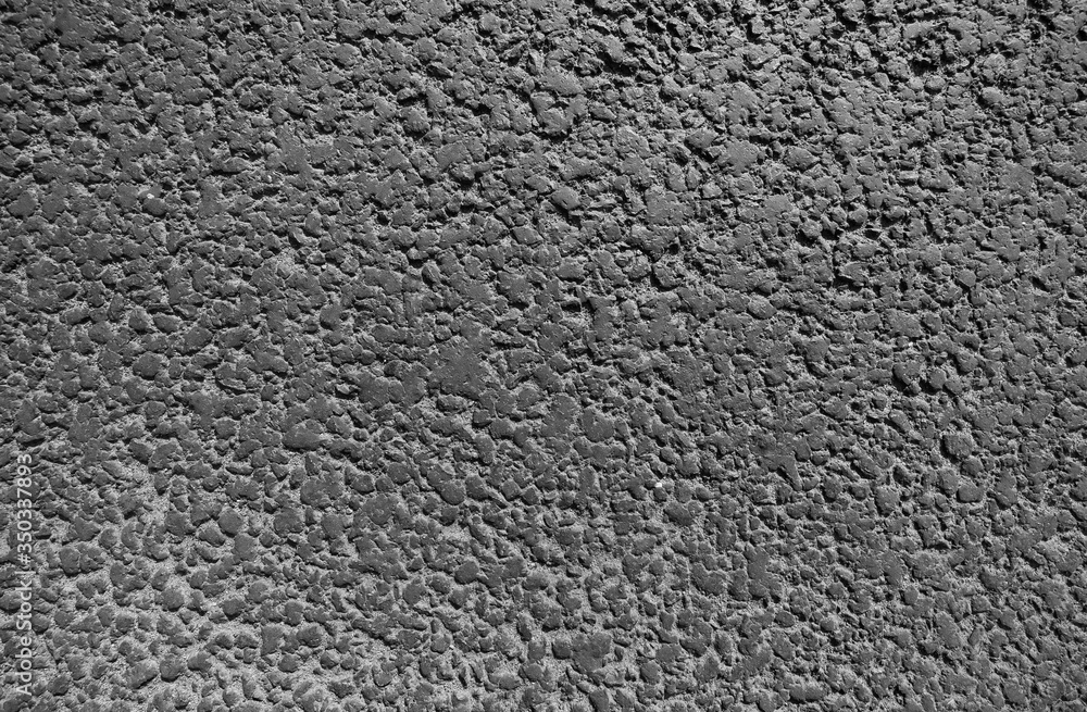Abrasive asphalt surface is macro on top Abrasive asphalt surface is macro on top