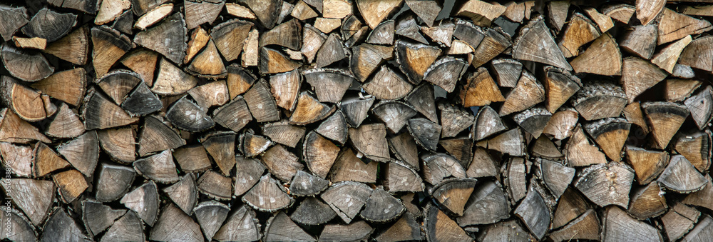 Wood logs background texture. Stack of firewood. Wood logs background texture. Stack of firewood.
