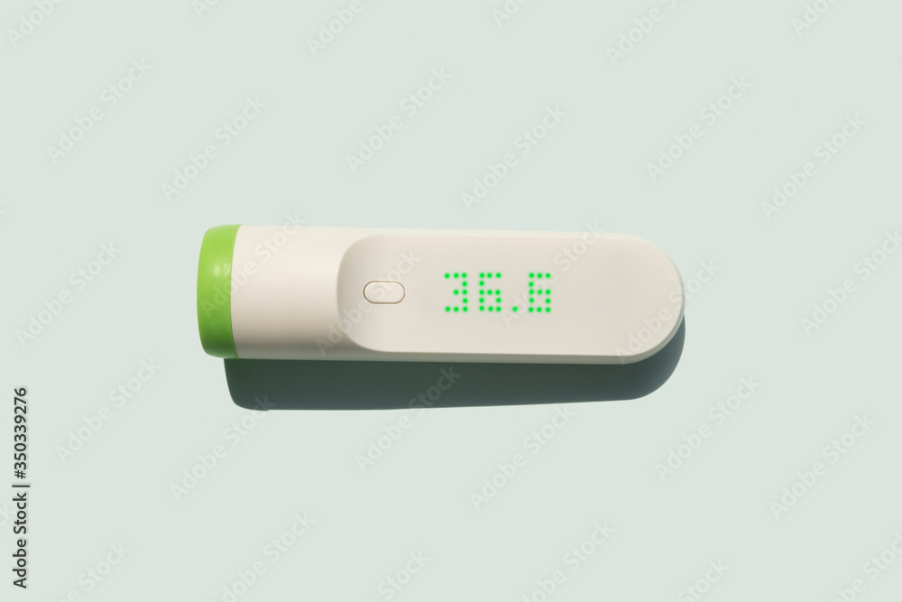 smart infra red thermometer showing optimal body temperature 36,6 smart infra red thermometer showing optimal body temperature 36,6