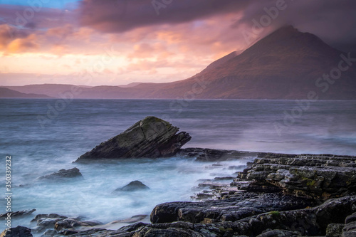 Elgol at sunset, on the dramatic Isle Of Skye in scenic Scotland, a fantastic adventure travel destination for a holiday vacation to view awesome picturesque scenery