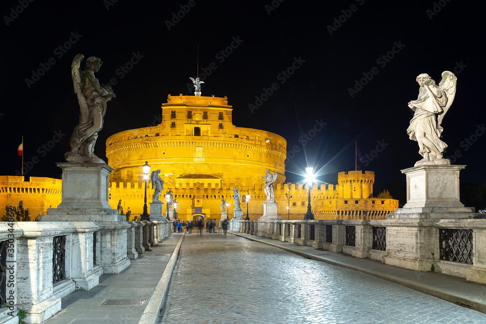 Fototapeta premium The Mausoleum of Hadrian, usually known as Castle of the Holy Angel at night. Initially built as a mausoleum for emperor and his family. The building was later used as a castle, and is now a museum.