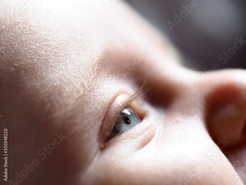 Canvas Print close up of a baby eye with blue eyes