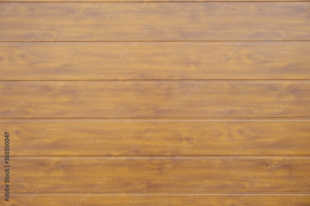 Naklejka premium New plastic fence or gate in wood look.