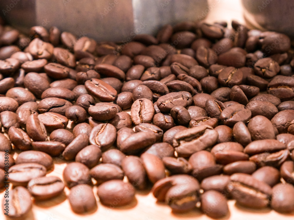 Organic coffee beans on wooden table
