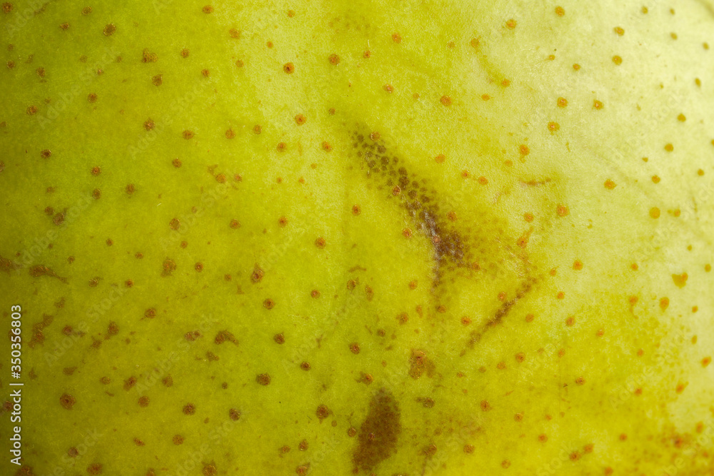 Obraz premium yellow pear skin texture or background