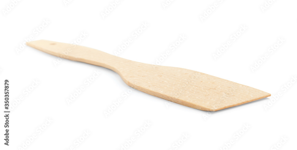 Wooden spatula isolated on white. Cooking utensil Wooden spatula isolated on white. Cooking utensil