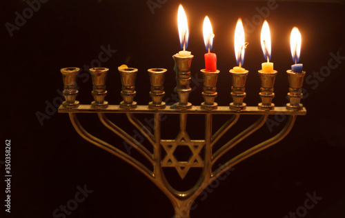 Hannukha candles lined up in Menorah 