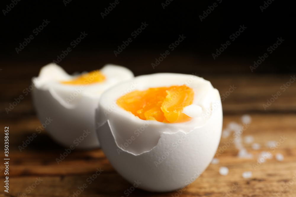 Tasty boiled chicken eggs on wooden table, closeup Tasty boiled chicken eggs on wooden table, closeup