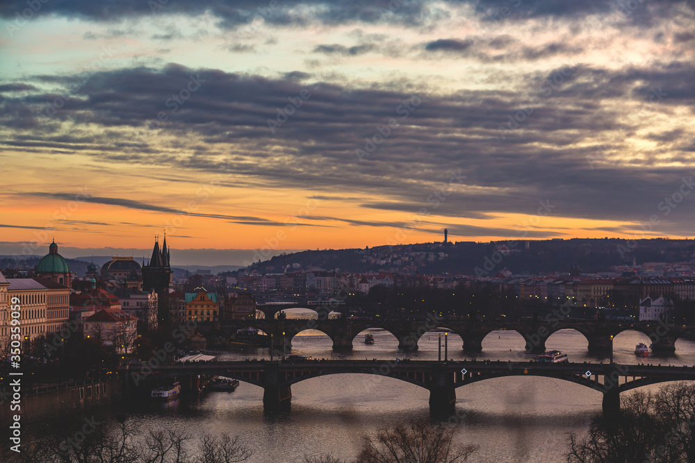 sunset over Charles bridge Prague