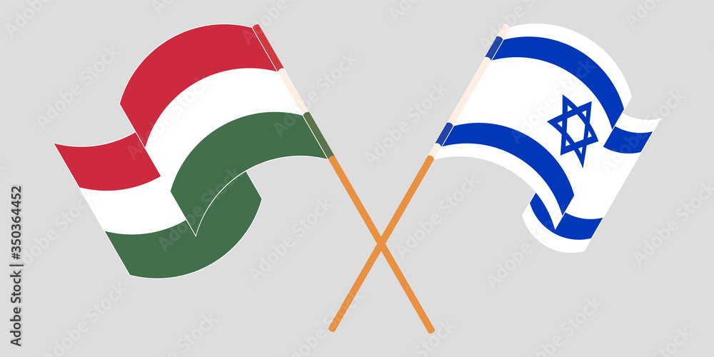 Crossed and waving flags of Hungary and Israel Crossed and waving flags of Hungary and Israel