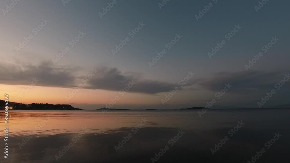 Beautiful sunset panorama. Composition of nature. Seascape with sea horizon, almost clear deep blue sky background in Urla Izmır. Loneliness, freedom, summer holiday, relax mood concept Beautiful sunset panorama. Composition of nature. Seascape with sea horizon, almost clear deep blue sky background in Urla Izmır. Loneliness, freedom, summer holiday, relax mood concept