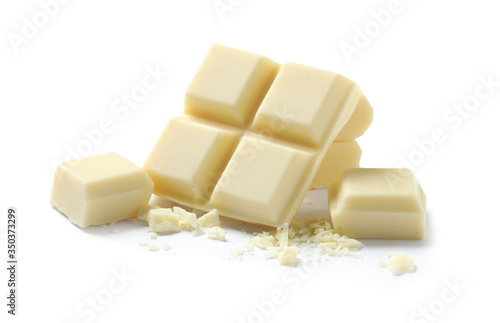 Fotografie Pieces of delicious chocolate bar isolated on white