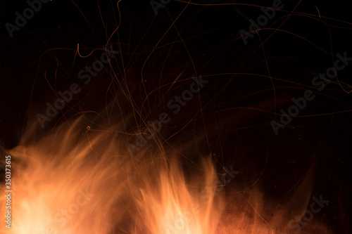 abstract fire background | orange fire sparks on black background | shadow and light | red fireflies | painting illustration digital drawing 