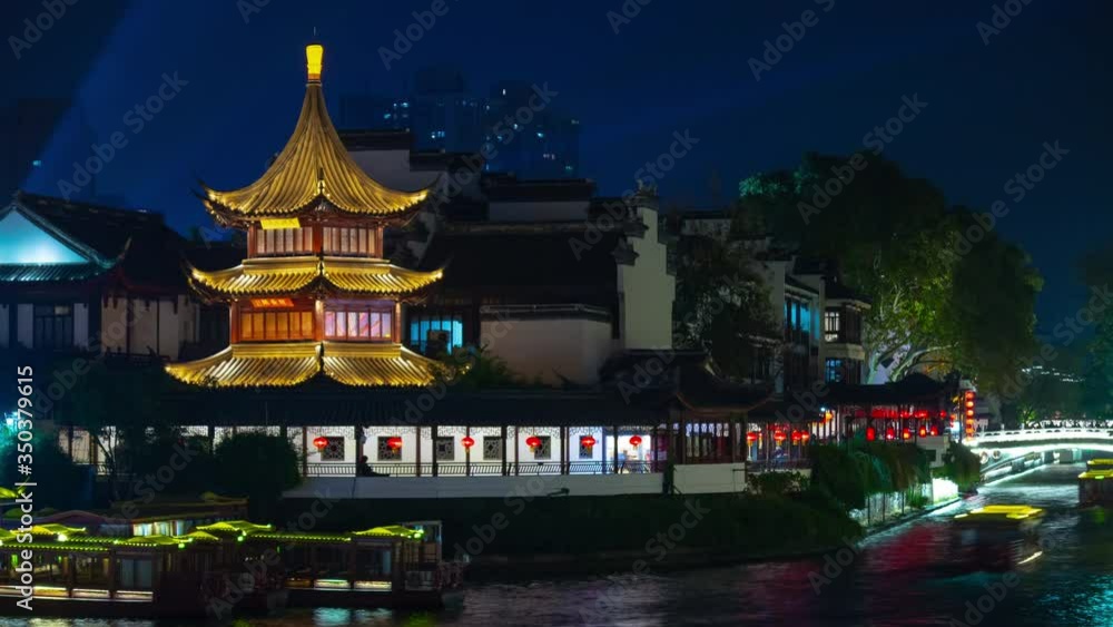 night illuminated famous nanjong city old town riverside traffic pagoda panorama timelapse 4k china night illuminated famous nanjong city old town riverside traffic pagoda panorama timelapse 4k china