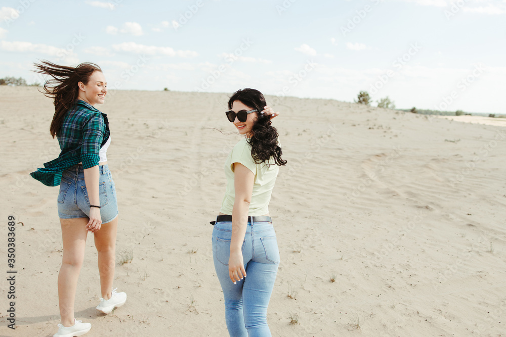 Traveling, camping, open air party. Female friends enjoying vacation together. Freedom, sightseeing friendship Traveling, camping, open air party. Female friends enjoying vacation together. Freedom, sightseeing friendship