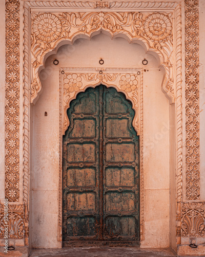 Photography Colored indian door green wood and white stone
