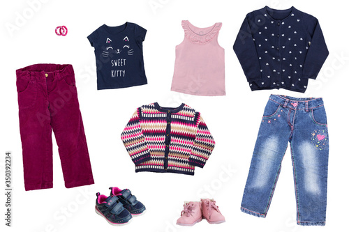 Set of warm clothes for a little girl isolated on a white background.