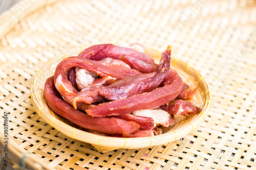 Dried meat in a bamboo dish