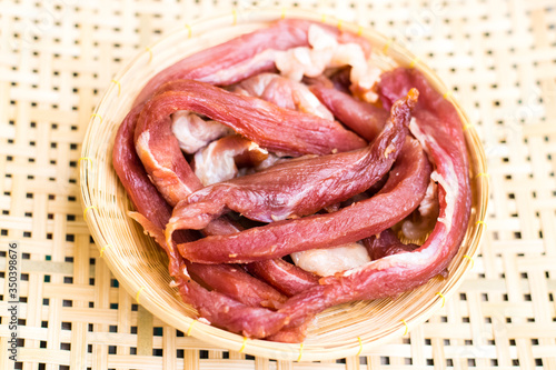 Dried meat in a bamboo dish