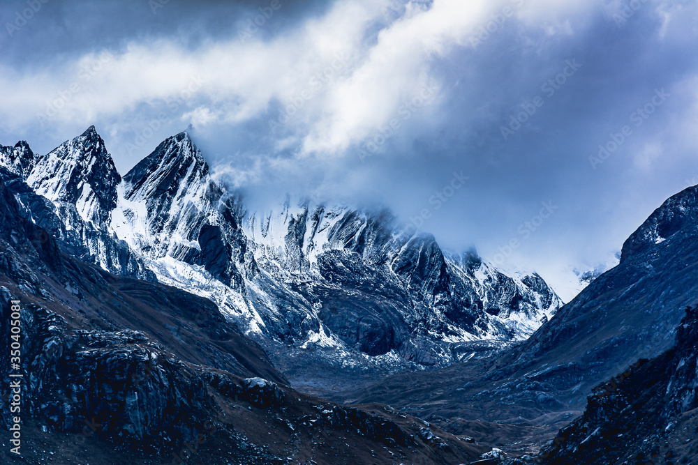 Obraz premium Pucaraju and Yanamarey Mountains in the Central Andes of South America. Cordillera Blanca, Peru. 