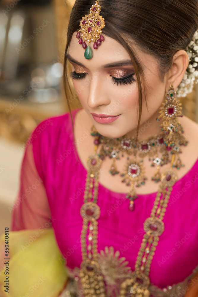 Fototapeta premium Asian Bride makeup shoot, Bridal campaign shoot. Lahore Pakistan. 31 July 2019.