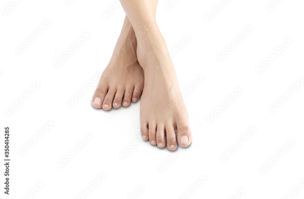 Beautiful perfect woman legs and feet on isolated pink background.Concept beauty and hydration of the skin. Beautiful perfect woman legs and feet on isolated pink background.Concept beauty and hydration of the skin.