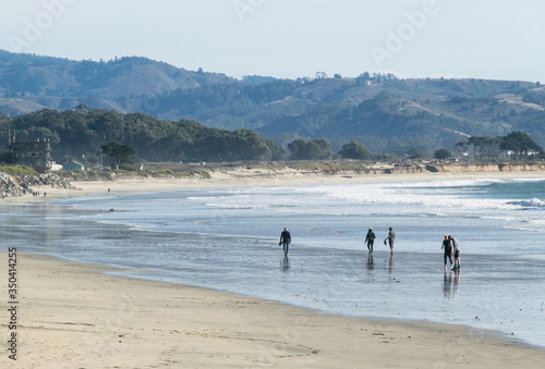 People enjoying being on the beautiful Half Moon Bay beach  California USA.