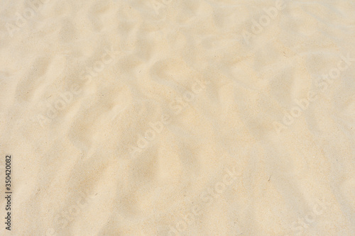 Beautiful beach sand texture as background.