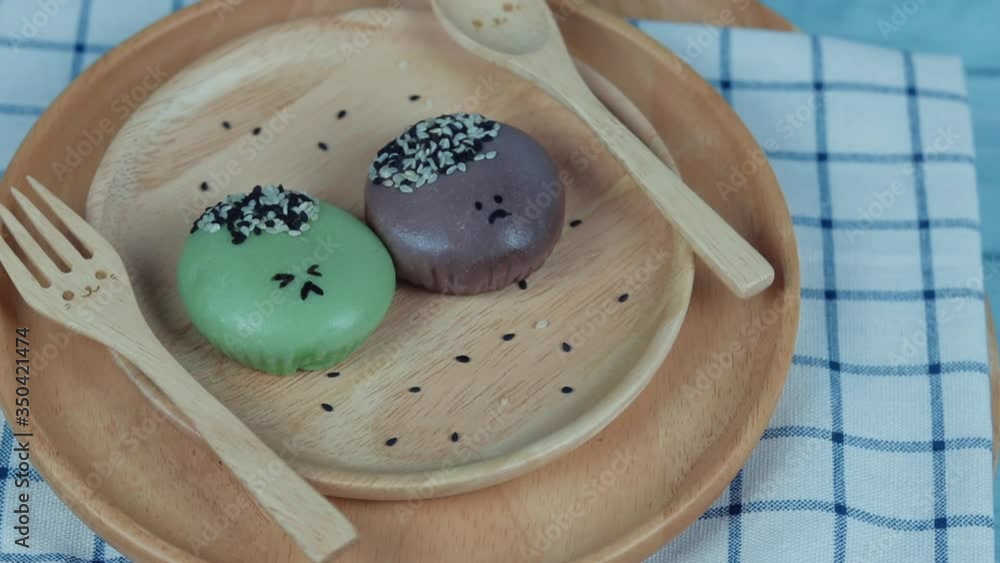 Vidéo Stock Emoji emoticon face in dessert steamed lava bun ,Cute face streamed custard dark