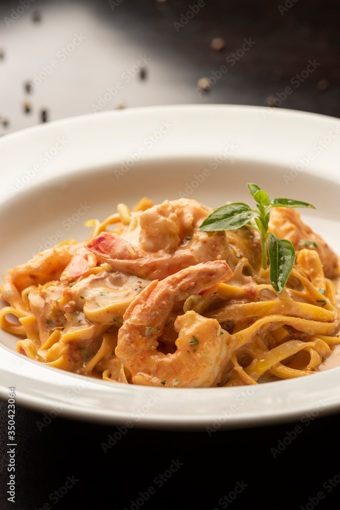 pasta fetuccini with shrimp and spices sauce