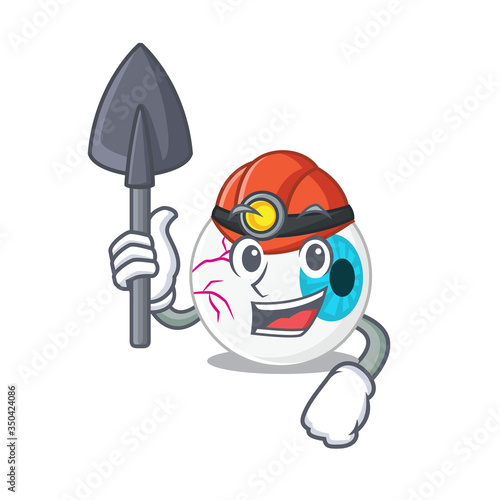A cartoon picture of eyeball miner with tool and helmet