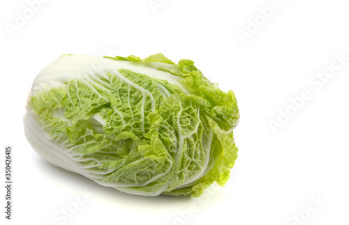 Peking cabbage close-up on a white isolated background, free space