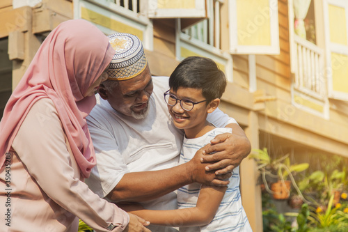 Grandson greeting his grandparents