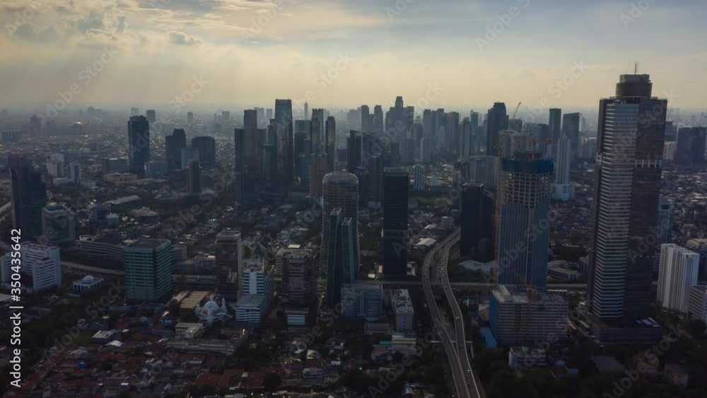 jakarta city sunny day jakarta city main traffic street skyscraper construction aerial panorama 4k indonesia jakarta city sunny day jakarta city main traffic street skyscraper construction aerial panorama 4k indonesia