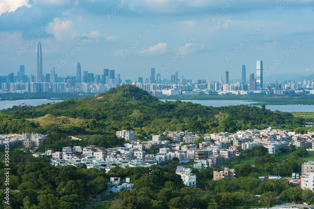 Skyline of downtown of Shenzhen city and rural village of Hong Kong city