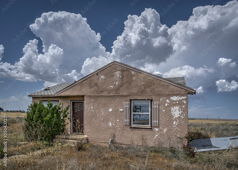 Abandoned structures on the Great Plains during springtime storms