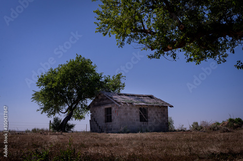 Abandoned structures on the Great Plains during springtime storms