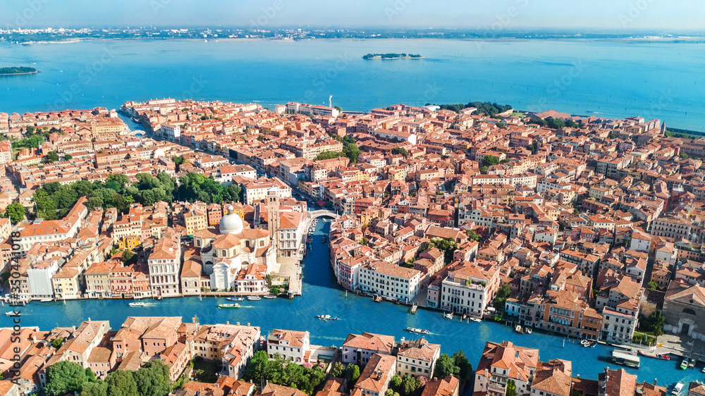 Venice city Grand Canal and houses aerial drone view, Venice island cityscape and Venetian lagoon from above, Italy
